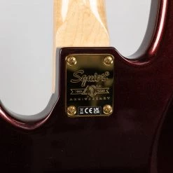 Squier 40th Anniversary Jazz Bass, Gold Edition In Ruby Red Metallic